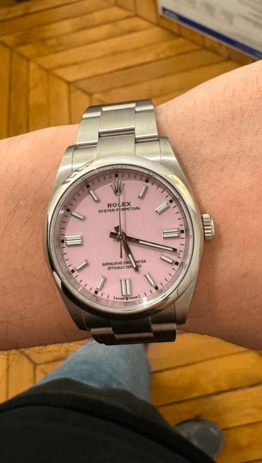 Steel Rolex Oyster Perpetual with a pink dial on an Oyster bracelet